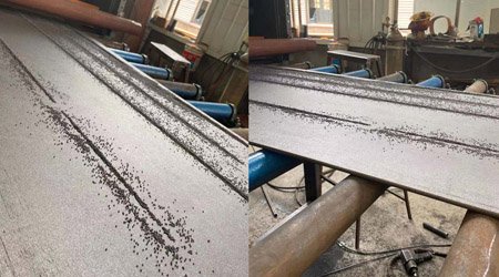 普華重工機械工程師快速解決輥道拋丸機堆砂問題